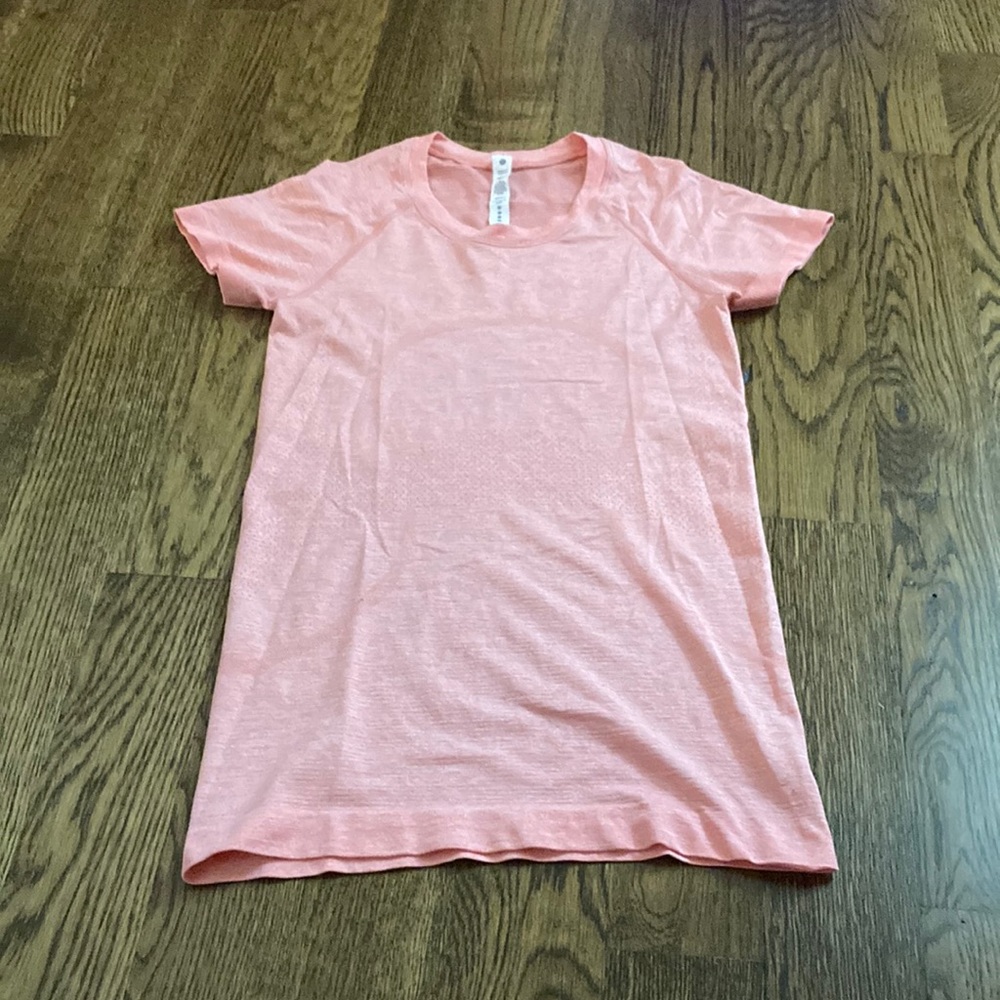 Pink lululemon short sleeve size 4